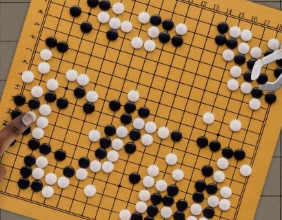 The Download: how AI is shaking up Go, and a cybersecurity mystery