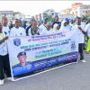 Police stage cybercrime awareness walk, warn against investment scams, sextortion